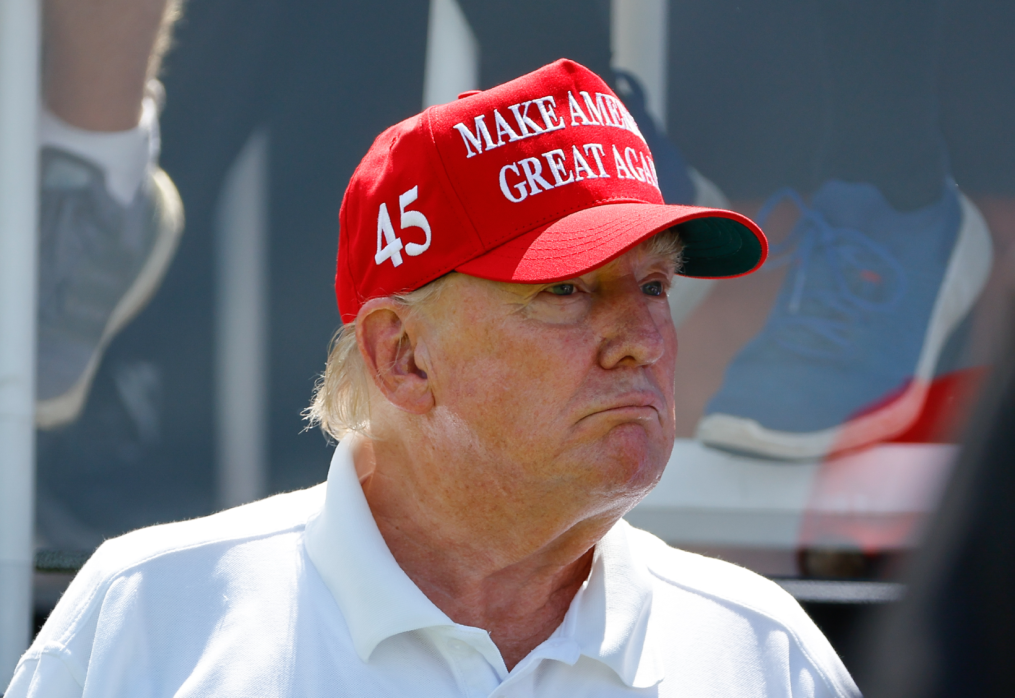Trump gripes on Truth Social that indictments are keeping him from PGA championship in Scotland